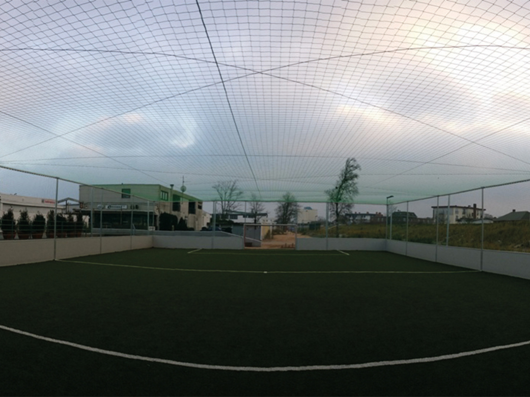 Ceiling net construction for stationary soccer court