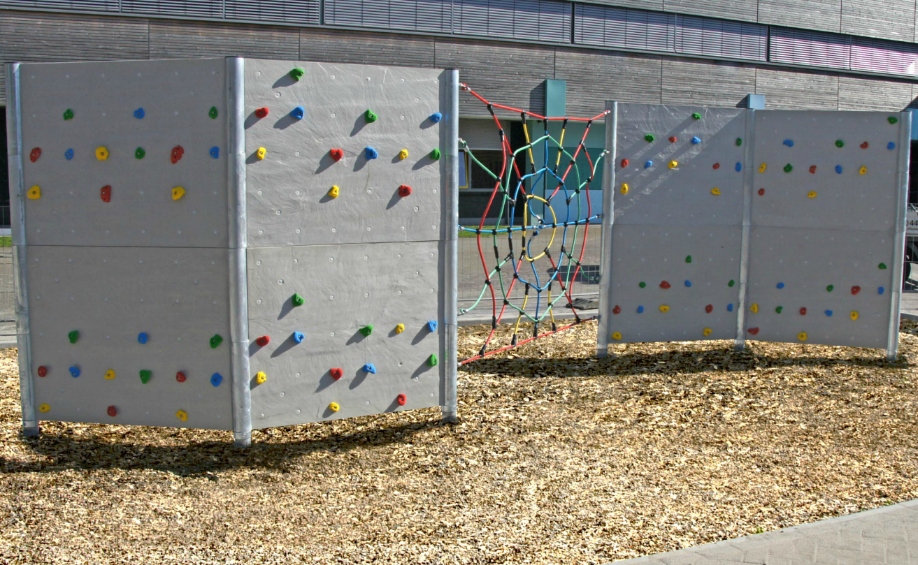 Kübler Sport® Outdoor Boulderwall made of polymer concrete with climbing net