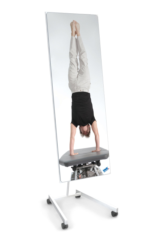 Therapy mirror including frame