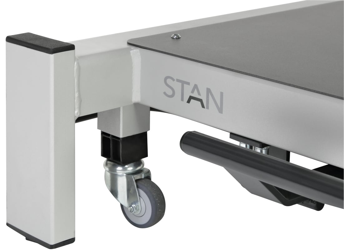 Rolling lift system for therapy table STAN
