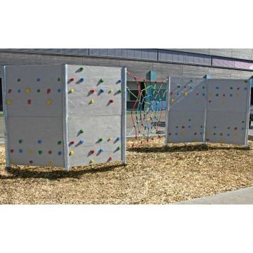 Kübler Sport® Outdoor Boulderwall made of polymer concrete with climbing net