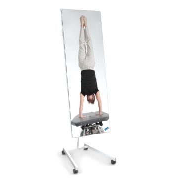 Therapy mirror including frame