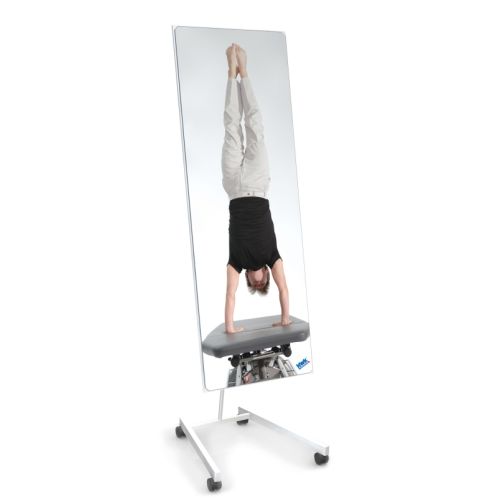 Therapy mirror including frame