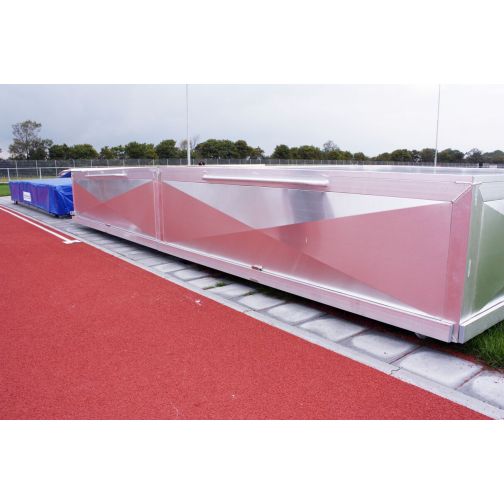 Mobile cover for high jump mats.