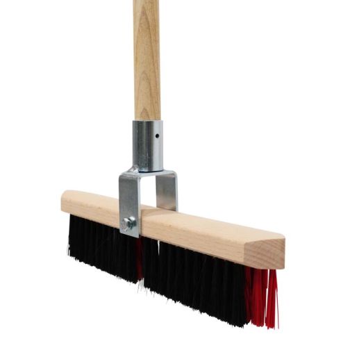 Sweeping brush with dual bristle system