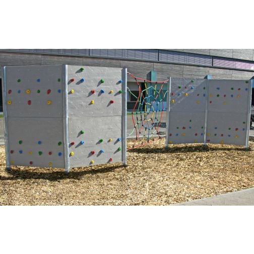 Kübler Sport® Outdoor Boulderwall made of polymer concrete with climbing net