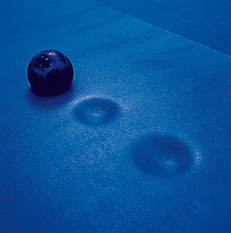 Shot put mat for indoor use, made of PVC foam.